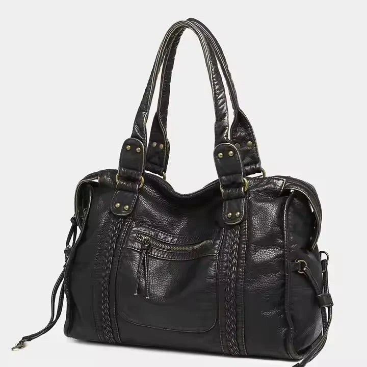 Moderne Damen Handtasche aus Vintage-Veganleder. Stilvolles Accessoire mit zeitlosem Charme, perfekt für sie.