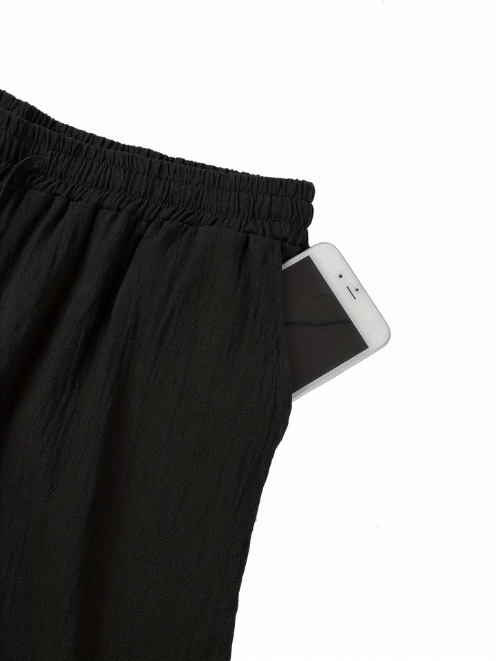 Lockerer Beinabschluss der grauen Herren Freizeithose, ideal für Sommer & entspannte Looks.