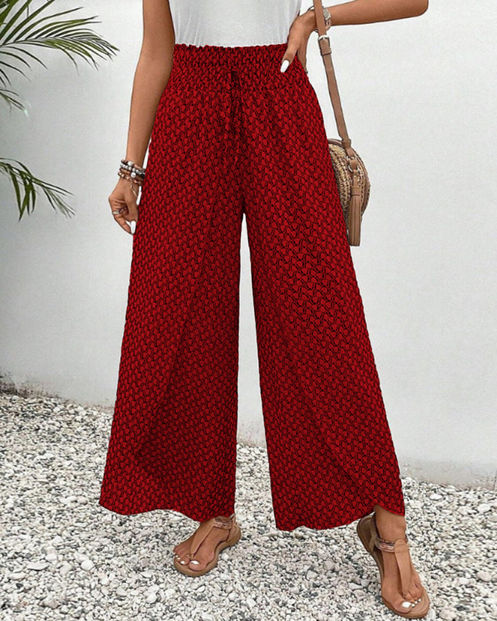 Bequeme Palazzo Hose für Damen, gemustert & fließend. Modische Sommerhose mit weitem Bein für Casual-Eleganz.