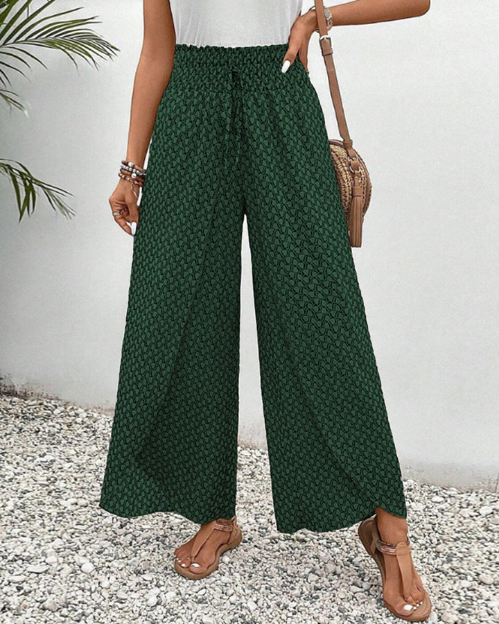 Vielseitige Damen Sommerhose mit weitem Bein. Gemusterte, fließende Palazzo Hose für Casual und elegante Anlässe.