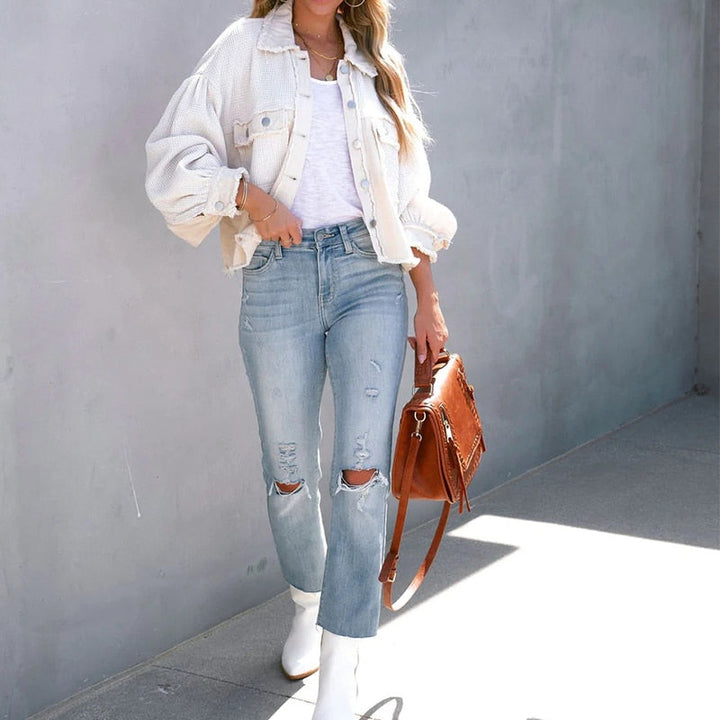 Elegante Damenjacke mit markanten Puffärmeln, ideal für moderne Herbst-Outfits.