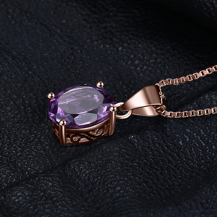 Blauer Topas Edelstein in ovalem Roségold-Anhänger für Damen. Exklusiver Schmuck.