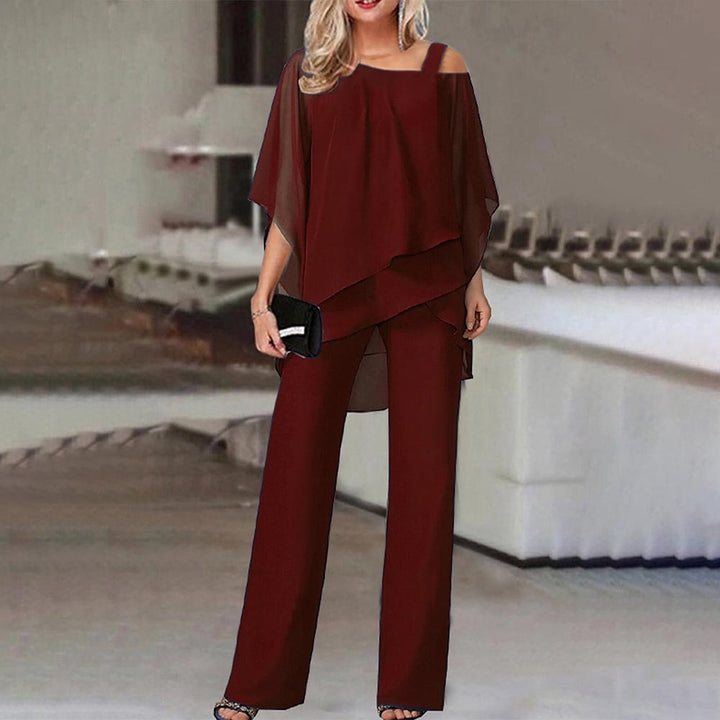 Stilvoller Damen Overall in Schwarz. Eleganter Zweiteiler mit Cold Shoulder. Ideal für Abend & Büro.