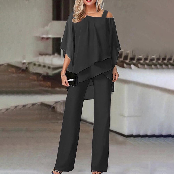Dunkelblauer Eleganter Damen Jumpsuit Zweiteiler mit Cold Shoulder. Stilvolle Büromode & Abendmode.