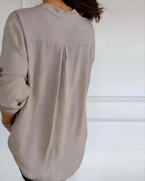 Elegantes Damen Pailletten Top mit stilvoller Knopfleiste. Perfekt für besondere Anlässe.
