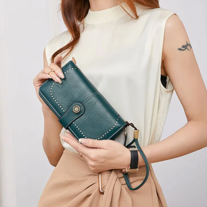 Alltagseleganz: Frauen Handgelenk Tasche mit RFID-Schutz und Kapazität.