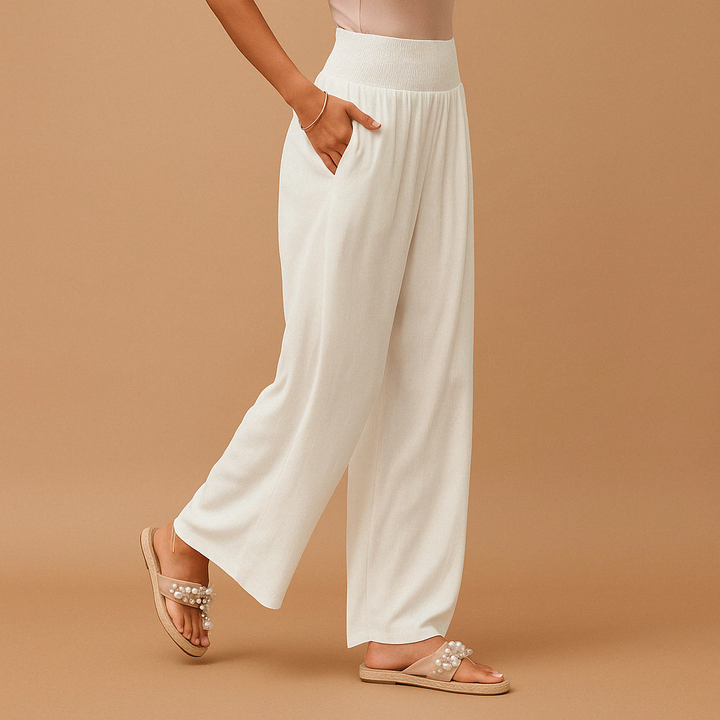 Luftige Damenhose mit weitem, geradem Schnitt und bequemem Gummibund, perfekt für heiße Sommertage.