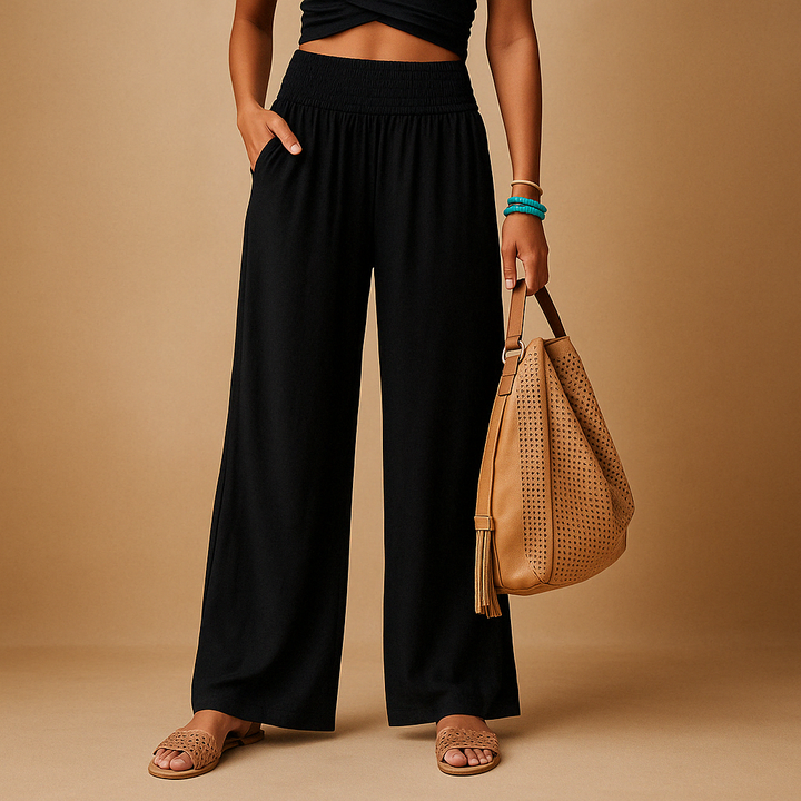 Modische Damenhose mit geradem Schnitt und bequemem Gummibund, ideal als Sommerhose, Alltagshose oder Strandhose.