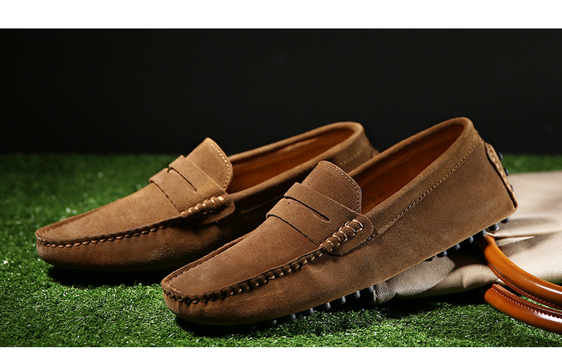 Brauner Penny Loafer für Herren, stilvoller Slip-on, ideal für smarte Freizeit-Outfits.