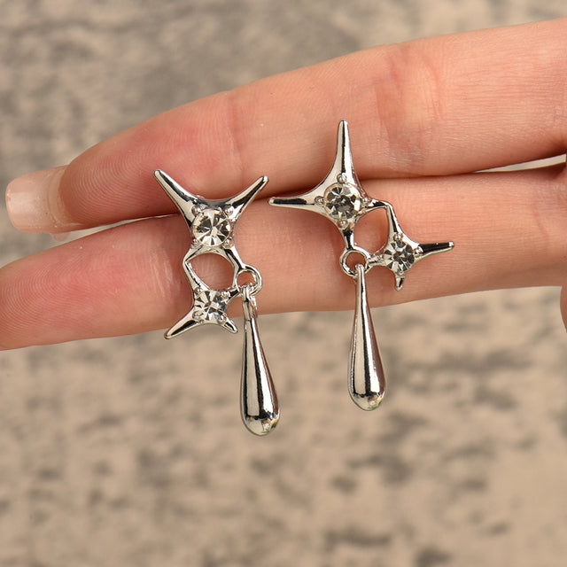 Edle Damen Wassertropfen-Ohrringe aus vergoldetem Metall, elegante Statement-Ohrhänger für besondere Anlässe.