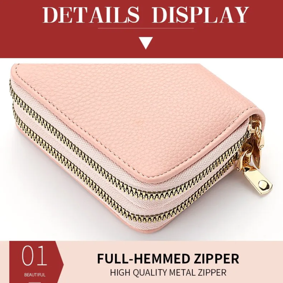 Geöffnete rosa Damen Brieftasche, zeigt Kreditkartenfächer, Geldscheinfach und Münzfach.