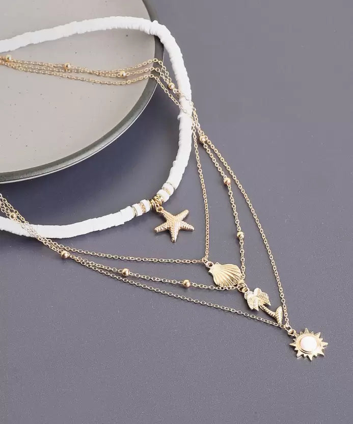 Damen Mehrschicht-Halskette mit Seestern und Muschel. Maritimer Edelstahlschmuck für Strand- & Boho-Looks.