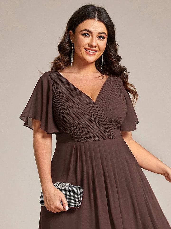 Chices Koralle Vokuhila Festkleid für Damen. Midi-Länge, Kurzarm, A-Linie, perfekt für Hochzeiten.