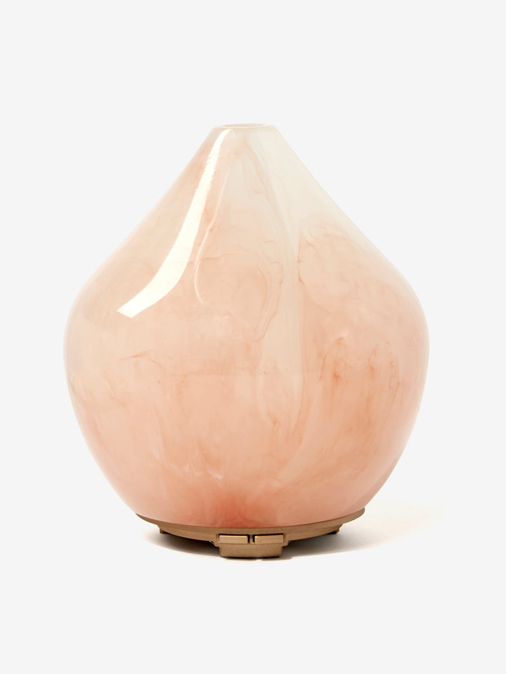Rosenquarz Aroma-Diffusor mit sanfter Ambientebeleuchtung & Ultraschall-Nano-Nebel für beruhigende Atmosphäre.