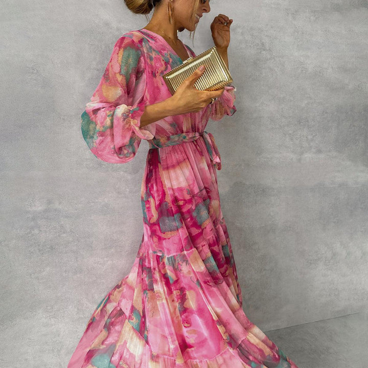 Elegantes Damen Maxi Kleid mit floralem Blumenmuster, V-Ausschnitt & stilvollen Laternenärmeln, perfekt für Sommerfeste.