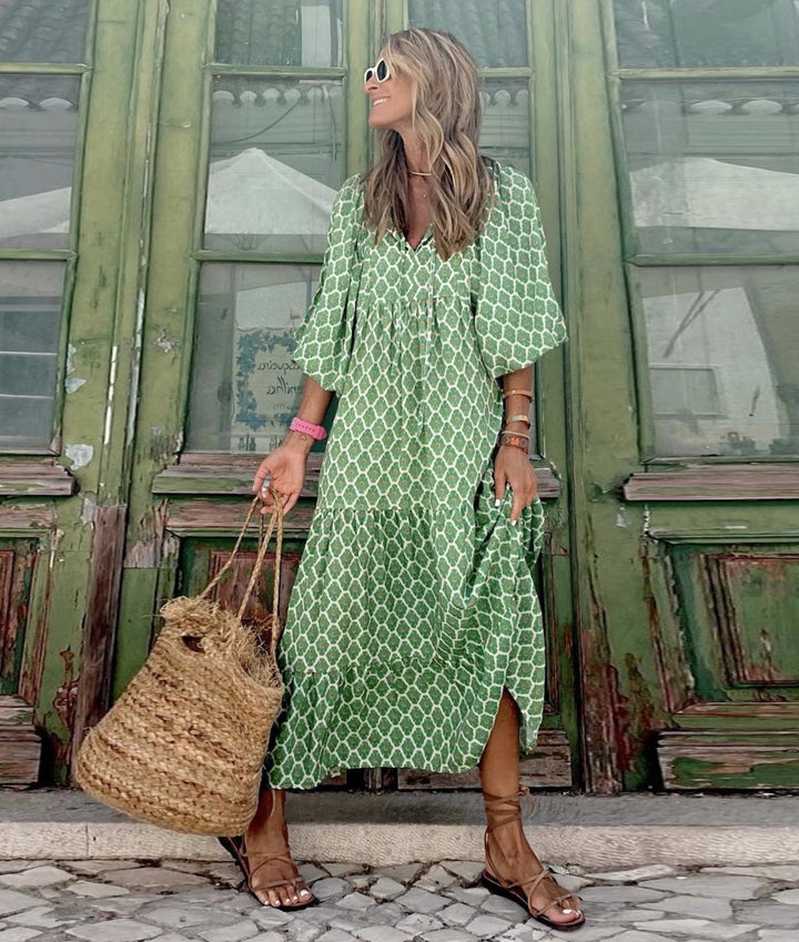 Gemustertes Boho Maxi Kleid für Damen mit elegantem V-Ausschnitt und weiten Ärmeln, perfekt für den Strand.