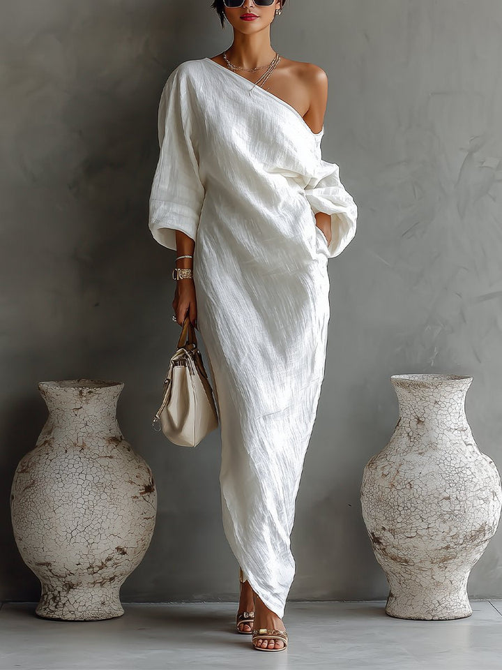 Elegantes One-Shoulder Abendkleid für Damen. Festliches Maxi-Kleid mit luxuriösen Volumenärmeln für besondere Nächte.