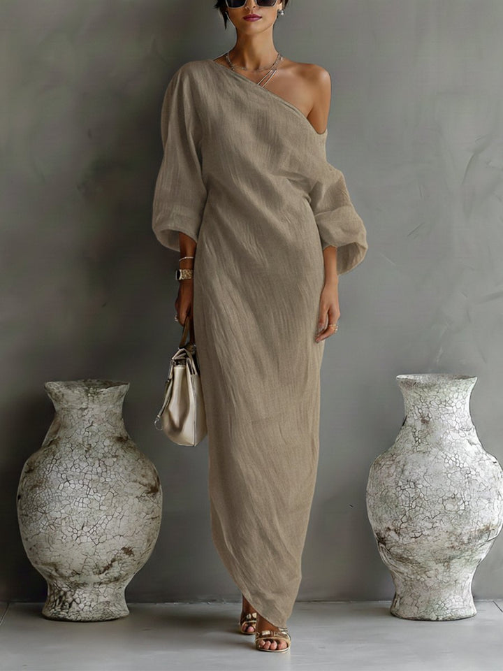 Vielseitiges Damen Maxi-Kleid, One-Shoulder mit eleganten Volumen-Ärmeln. Perfekt für festliche Frühling/Sommer-Events.