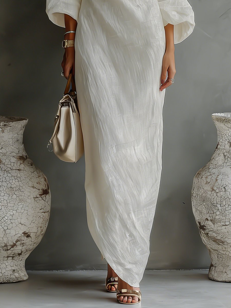 Modernes Damen Abendkleid: Asymmetrisches One-Shoulder Maxi-Kleid mit auffälligen Volumenärmeln für einen eleganten Auftritt.