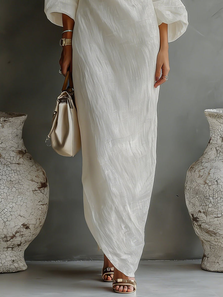 Modernes Damen Abendkleid: Asymmetrisches One-Shoulder Maxi-Kleid mit auffälligen Volumenärmeln für einen eleganten Auftritt.