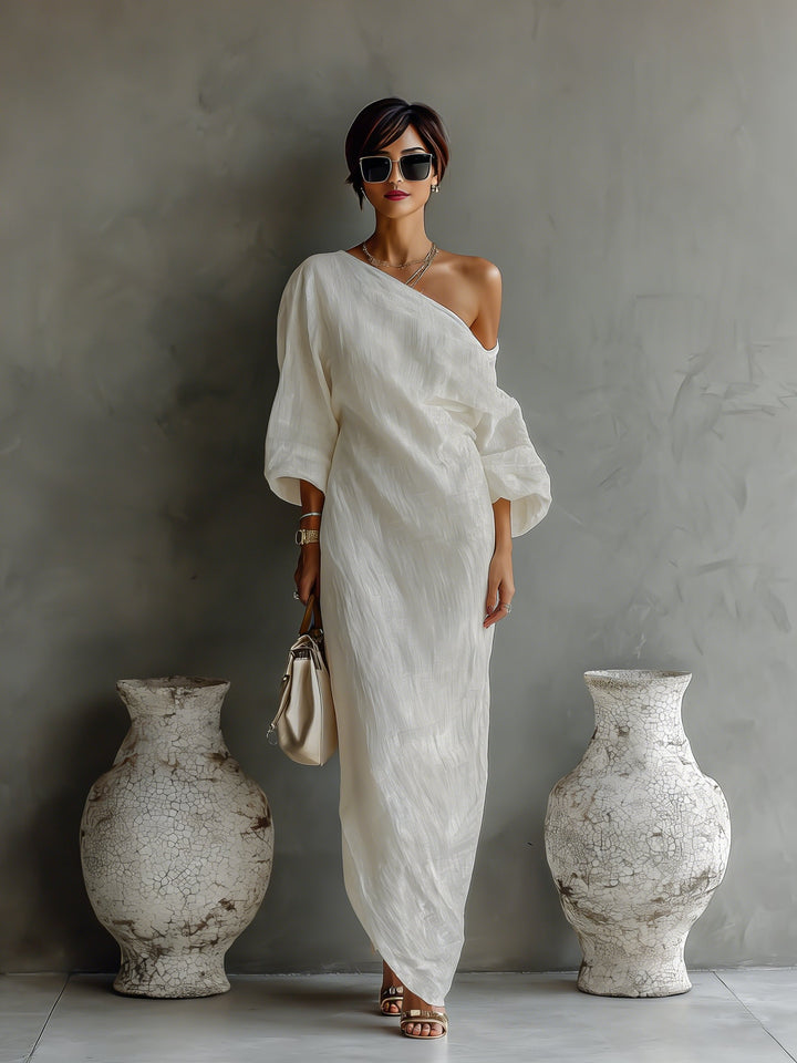 Dramatisches Damen One-Shoulder Maxi-Kleid mit Volumen-Ärmeln, ideal als festliches Abend- oder Hochzeitskleid.