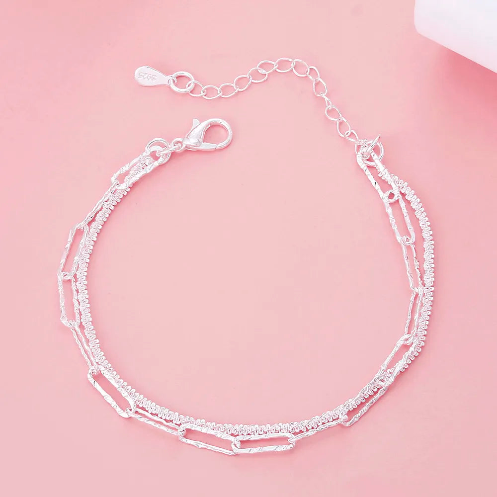 Elegantes Damen Doppelkettenarmband aus 925er Sterlingsilber, verstellbar, zeitloser Armschmuck für Frauen.