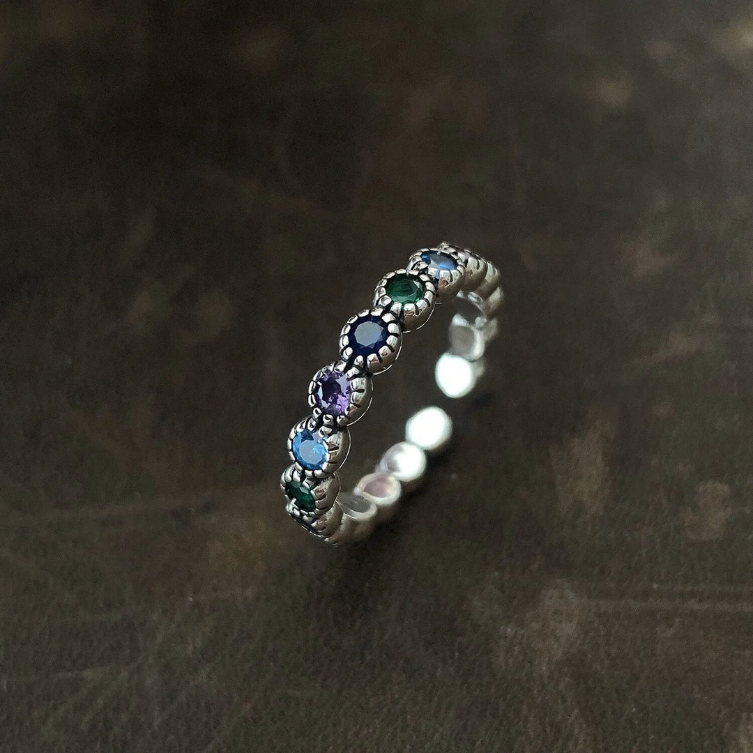 Eleganter Damen Blumenring aus 925er Silber mit funkelnden Zirkonsteinen. Perfekter Modeschmuck.