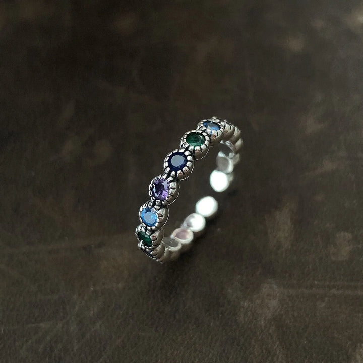 Eleganter Damen Blumenring aus 925er Silber mit funkelnden Zirkonsteinen. Perfekter Modeschmuck.