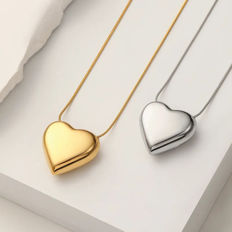 Filigrane Herzkette für Damen, ein romantisches Accessoire mit edlem Pfirsich Herz Design.