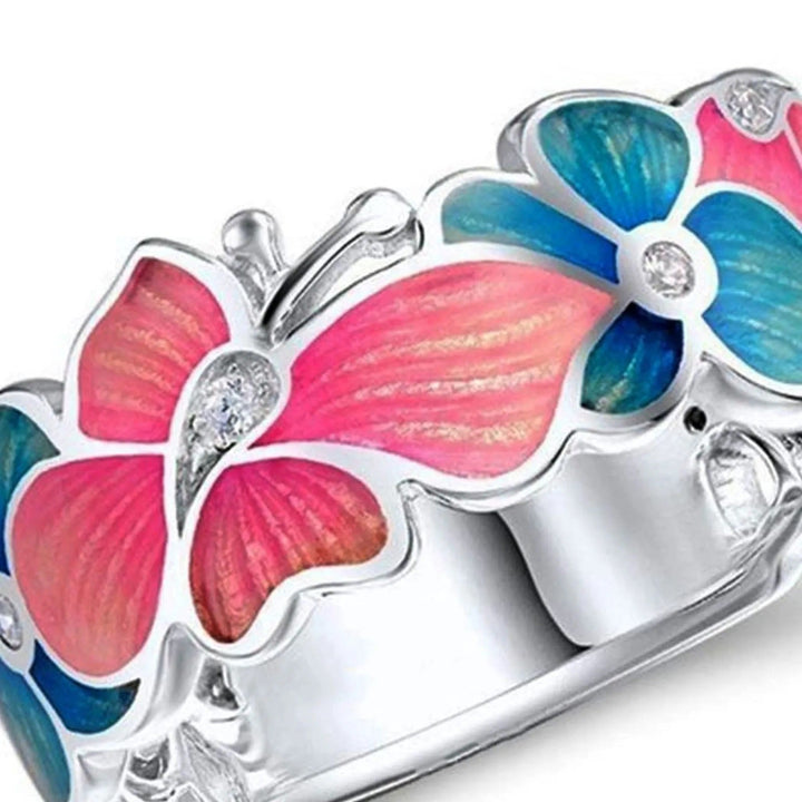 Eleganter Damen-Schmetterlingsring aus Silber mit glänzender Emaille und funkelnden Zirkonia-Akzenten.