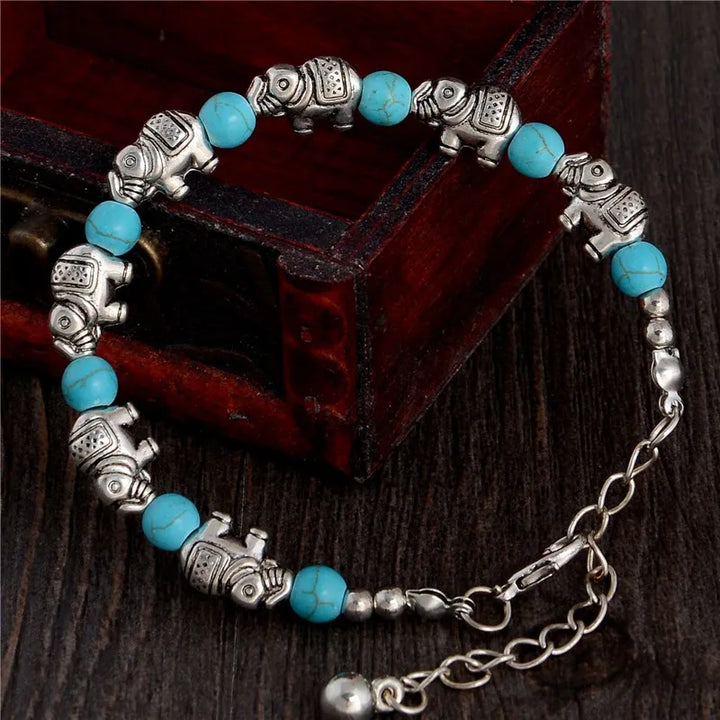Silbernes Unisex-Elefantenarmband mit Kristall-Akzenten, elegant am Handgelenk. Schmuck für Stärke.