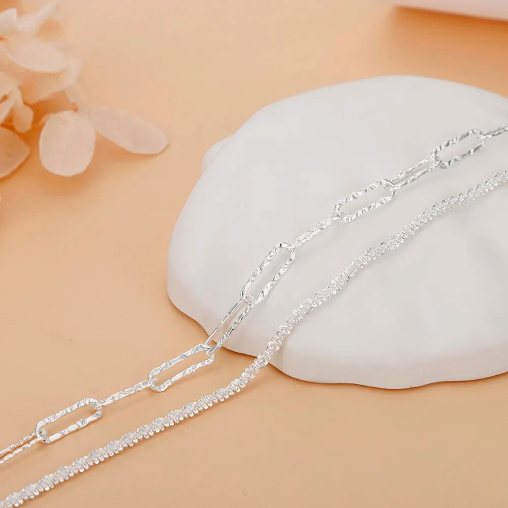 Modernes 925er Sterlingsilber Damenarmband, geometrisches Doppelketten-Design, eleganter Schmuck.