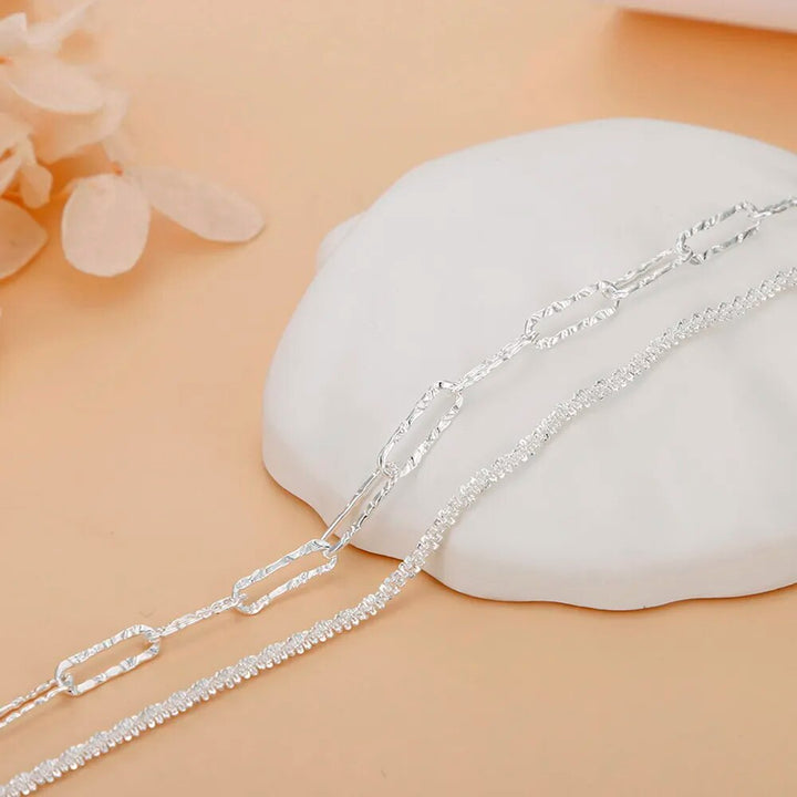 Modernes 925er Sterlingsilber Damenarmband, geometrisches Doppelketten-Design, eleganter Schmuck.