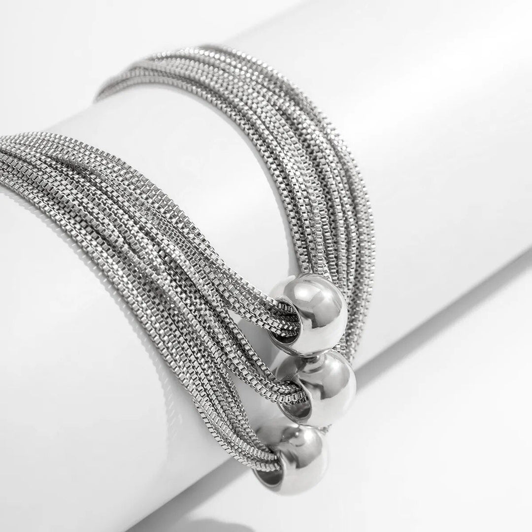 Auffällige Damen Halskette mit großer Kugel und Gliederkette aus Edelstahl. Ideal für einen Statement-Look.