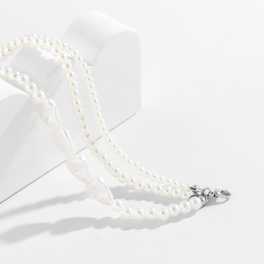 Attraktives Damen Perlenarmband, geschichteter Armschmuck mit Barockperlen, zeitloses und elegantes Accessoire.
