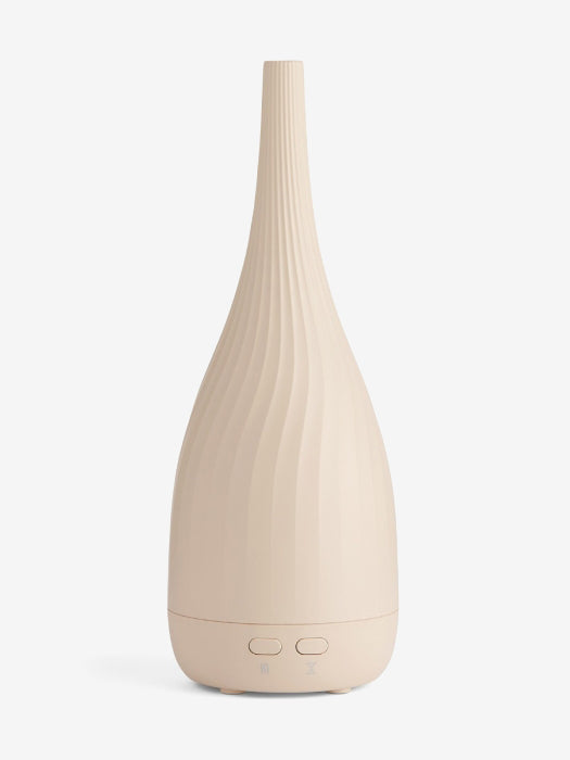 Eleganter Ultraschall Aroma-Diffusor für ätherische Öle und Raumduft, fördert Entspannung & Wohlbefinden.