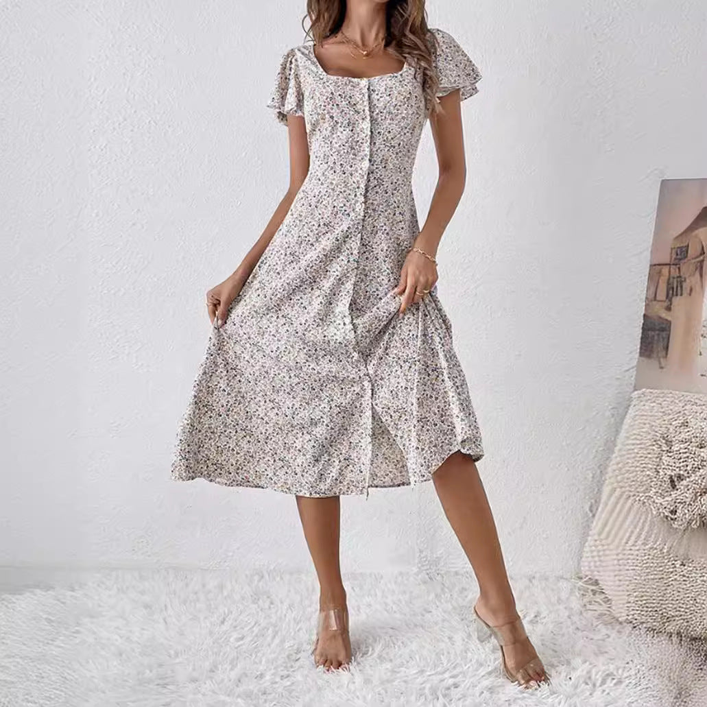Romantisches A-Linien Damen Sommerkleid in Midi-Länge mit Blumenmuster & Knopfleiste.