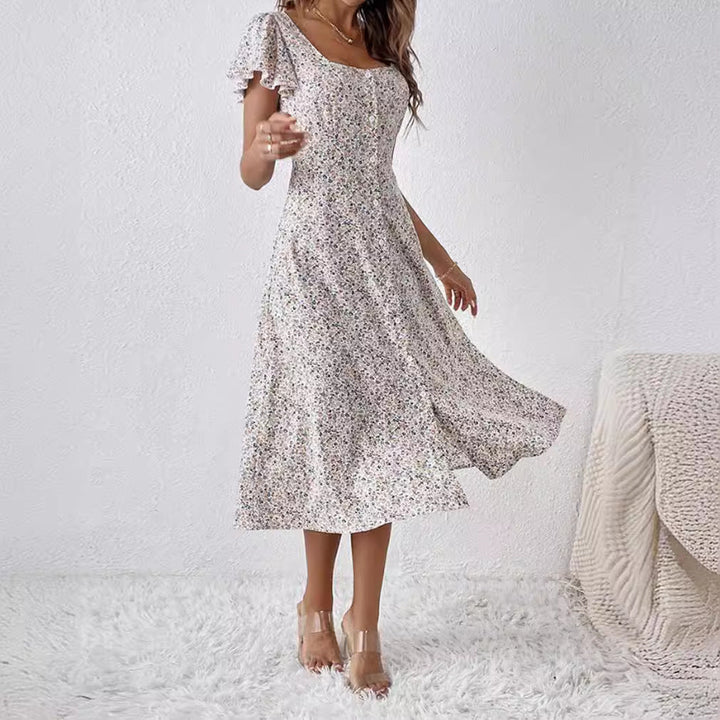 Elegantes weißes Damen Midikleid mit Blumenprint, quadratischem Ausschnitt für einen frühlingshaften Look.