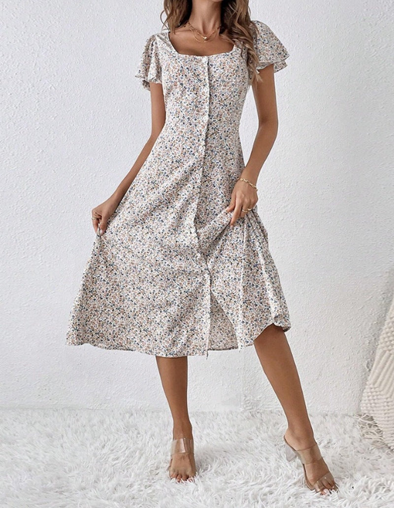 Weißes Damen Midikleid mit Blumenmuster, eckigem Ausschnitt und Flatternärmeln. Ideal für Sommer & Frühling.
