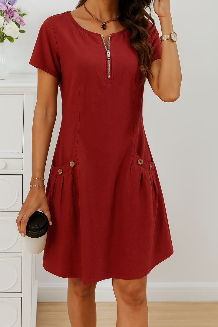 Vielseitiges Damen Sommer-Midikleid mit Kurzarm, legerem Schnitt & praktischen Taschen. Perfekt für Alltag & Freizeit.