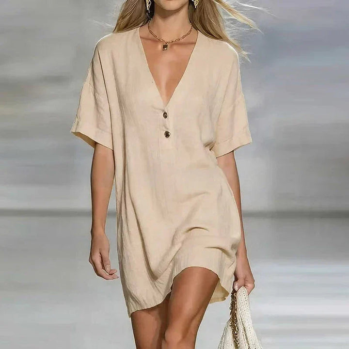 Trendiges Damen Minikleid, locker geschnitten, mit V-Ausschnitt und Knopfleiste. Stylisches Kurzarm-Sommerkleid für Damen.