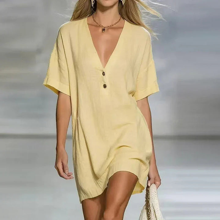 Damen Minikleid mit V-Ausschnitt und Knopfleiste, ideal als leichtes Sommerkleid oder Freizeitkleid. Kurzarm, locker.