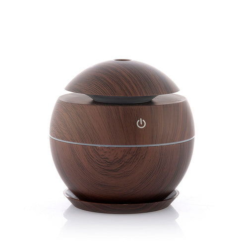Mini Aroma Diffusor mit Ultraschall-Technologie für entspannende Aromatherapie zu Hause und im Büro.