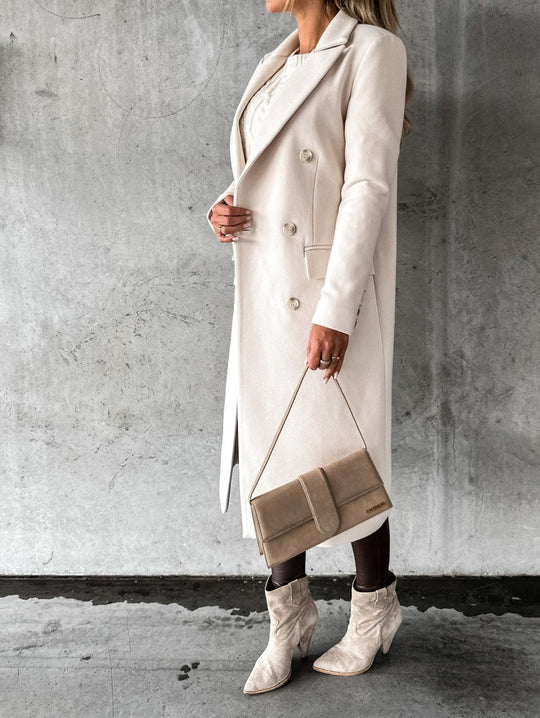 Klassischer Damen Wintermantel, langer Schnitt, bietet Wärme & Komfort als elegante Oberbekleidung für Herbst & Winter.