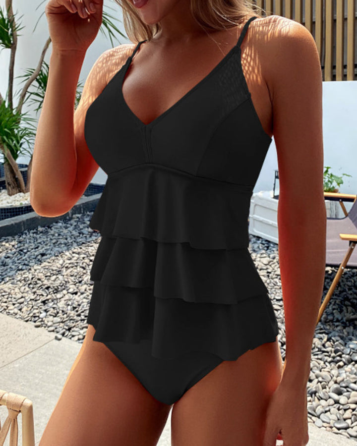 Blauer Damen Zweiteiler Badeanzug Janah. Bikini-Top und High-Waist-Hose für modische Strandtage im Urlaub.