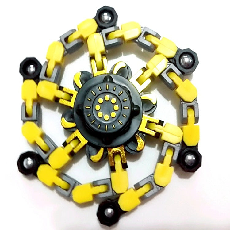 Roboter Spinner Spielzeug auf Tisch, bereit für farbwechselnden Spielspaß; Fidget Toy & Lernspielzeug für Kinder.