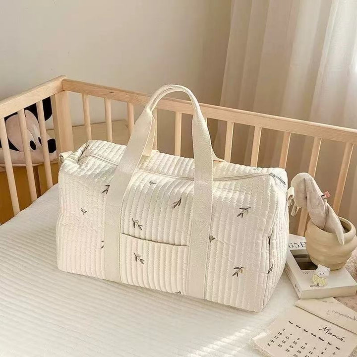 Moderne Muttertasche in schickem Design, die Funktionalität und Stil für den Alltag vereint.