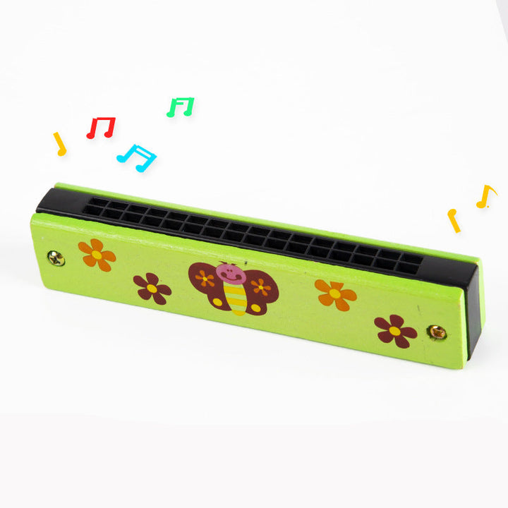Kleines Kinderinstrument: Bunte Mundharmonika, fördert Rhythmusgefühl und Gehör.