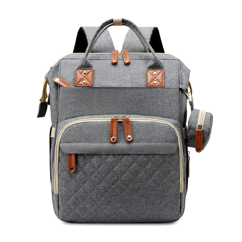 Wickelrucksack und mobiles Wickelbett in einem. Ultimative Lösung für Eltern, die viel mit ihrem Baby reisen.
