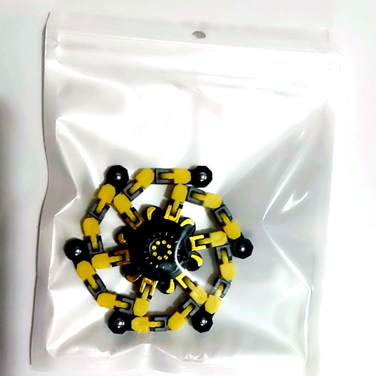 Roboter Spinner auf dem Schreibtisch, ideal als Anti-Stress Fidget Toy für Konzentration & Lernspielzeug.